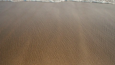 Waves calmly washing on sandy beach. Stock Footage 119123672