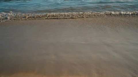 Waves calmly washing on sandy beach. Stock Footage 119125353
