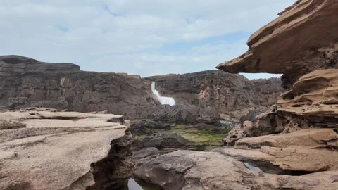 Waves cascading over rocks Stock Footage 333583773
