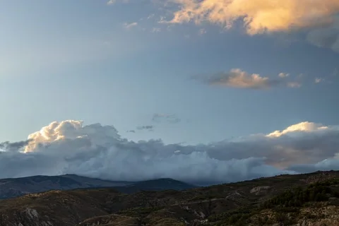 Waves of clouds on natural park of Sierra Nevada Stock Footage 216580008