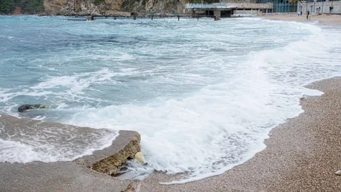 Waves at the coast of the sea at cloudy weather Stock Footage 122178258