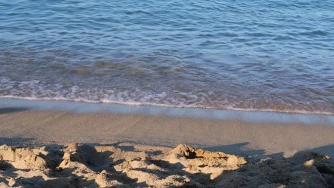 Waves of the coastline on the sandy beach of the Mediterranean Sea. Stock Footage 240731951