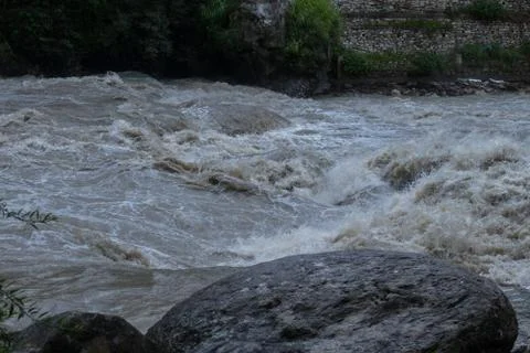 Waves Colliding due to High Current Flow of a River amongst Rocks and Stones, 5K Stock Photos