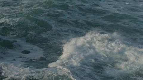 Waves colliding with each other in slow motion Stock Footage 297791700