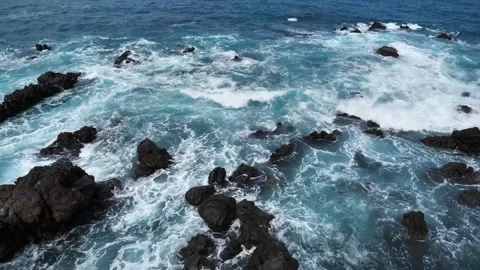 Waves colliding with rock containing sea rock nature 4k video Видео 164459633