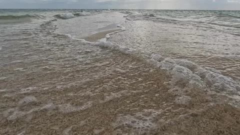 Waves Colliding on Sandbar Part 1 (low angle) Stock Footage 317586167
