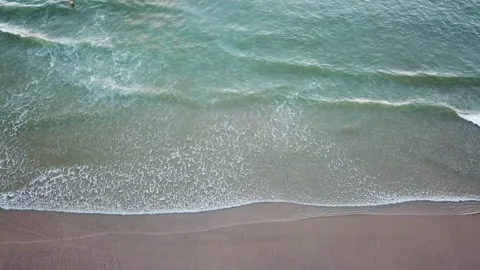 Waves coming in 4k Drone Stock Footage 147440320