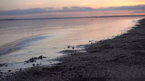 Waves coming in against the beach Stock Footage 137430800