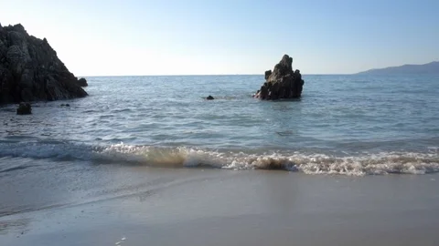 Waves Coming Ashore at Palinuro Beach Italy 60p 60sec 2 no color correction Stockbeeldmateriaal 103693356