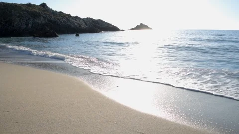 Waves Coming Ashore at Palinuro Beach Italy 60p 60sec 3 no color correction 動画素材 103693799