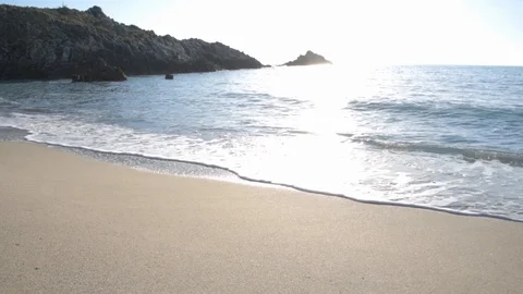 Waves Coming Ashore on a Sandy Beach at Palinuro, Italy 動画素材 103691974