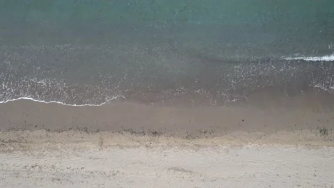 Waves coming in at the beach Stock Footage 232983498