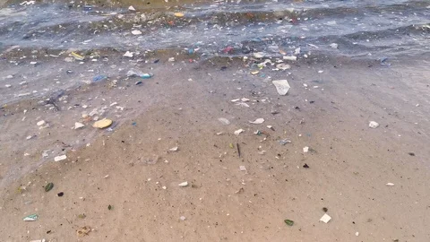 Waves coming with junk. Stock Footage 120048587