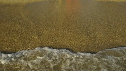Waves coming onto the pebble beach Stock Footage 212931798