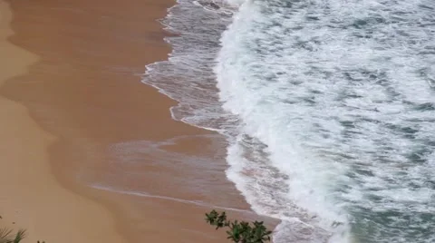Waves coming on sandy beach Stock Footage 54065645