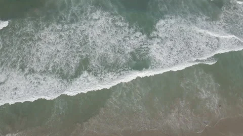 Waves coming in to shore from above Stock Footage 227066136