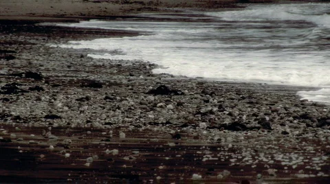 Waves coming onto the shore Stock Footage 646473