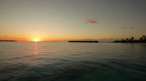 Waves coming in at sunset Stock Footage 1016959