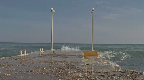 Waves crach the pier Stock Footage 52980213