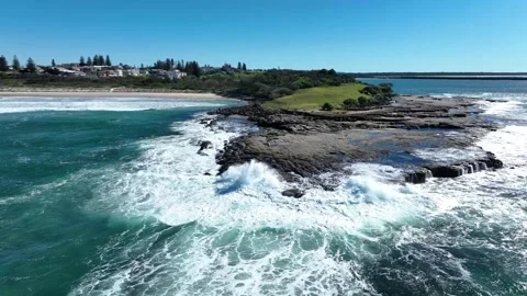 Waves craching against rocks from drone Stock Footage 331017499