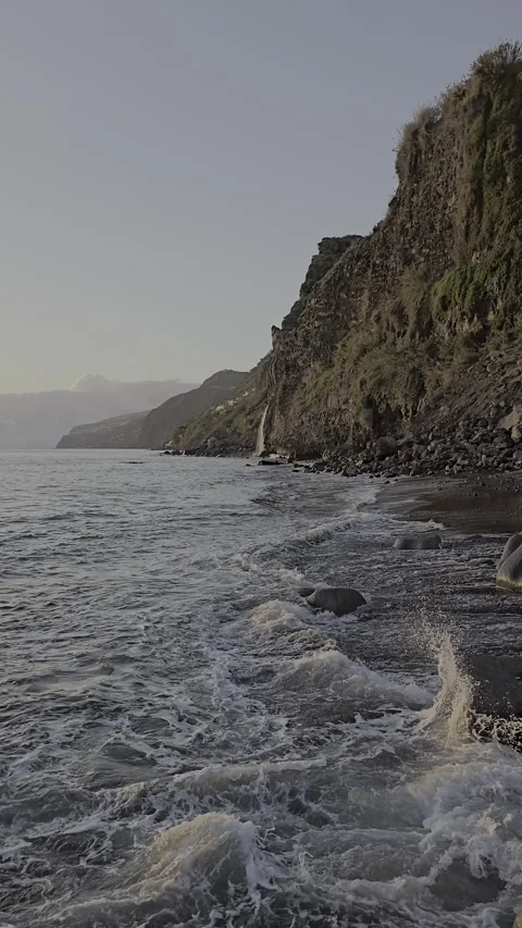 Waves crash against basalt cliffs on Madeira’s wild north coast. Stock Footage 310024503