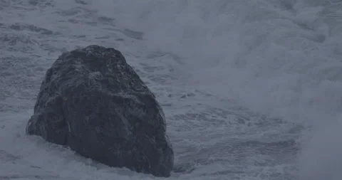 Waves Crash Against Rock Stock Footage 192383285