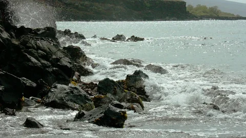 Waves crash against the rocks Stock Footage 100452139
