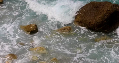 Waves crash against the rocks Stock Footage