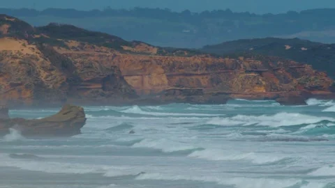 Waves Crash Against Sphinx Rock on Rugged Sorrento Coastline Stock Footage 316591182