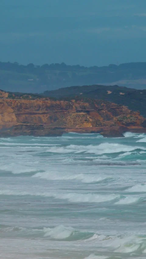Waves Crash Against Sphinx Rock on Sorrento Coastline Stock Footage 316657383