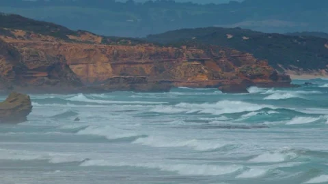 Waves Crash Against Sphinx Rock on Sorrento Coastline Stock Footage 316664510