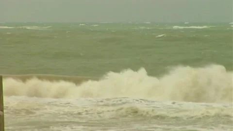 Waves Crash Along Shoreline During Hurricane Dennis Stock Footage 290999744
