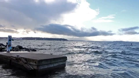 Waves crash Barge ferry crosses to the left Evening Seattle Sound Washington  Video stock 58628796