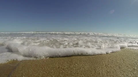 Waves crash into camera on Beach HD Stock Footage 44618158