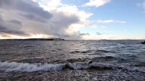 Waves crash ferry crosses to the left Evening Seattle Sound Washington Video stock 58628838