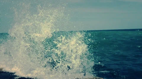 Waves Crash into Lakeshore, Slow Motion Footage Stock Footage 38354355
