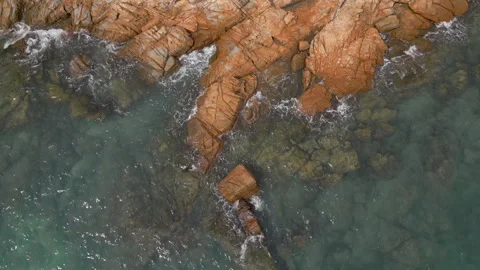 Waves Crash Over Red Rocks Koh Samet Island Thailand Drone Overhead Angle 4K Stock Footage 341597259