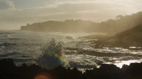 Waves crash on Pfeiffer Beach on Sunset Stock Footage 64009093