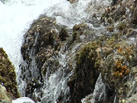 Waves crash rock FAST SHUTTER Stock Footage 709008