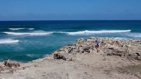 Waves Crash On A Rock In The ocean Stock Footage 125428712
