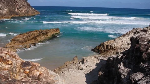 Waves Crash On A Rock In The ocean Stock Footage 125428941