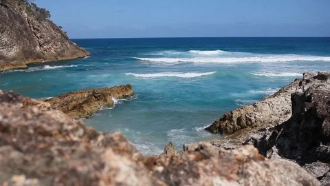 Waves Crash On A Rock In The ocean Stock Footage 125428978