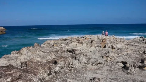 Waves Crash On A Rock In The ocean Stock Footage 125429036