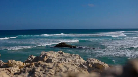 Waves Crash On A Rock In The ocean Stock Footage 125429116