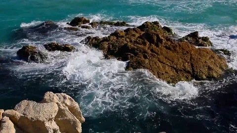 Waves Crash On A Rock In The ocean Stock Footage 125429165