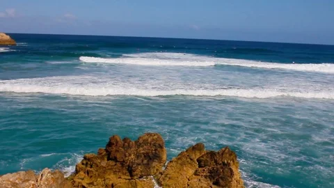 Waves Crash On A Rock In The ocean Stock Footage 125429199