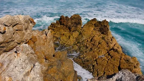 Waves Crash On A Rock In The ocean Stock Footage 125429270