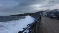 Waves crash onto rocks and railings in after math of hurricane Gonzalo HD Footage