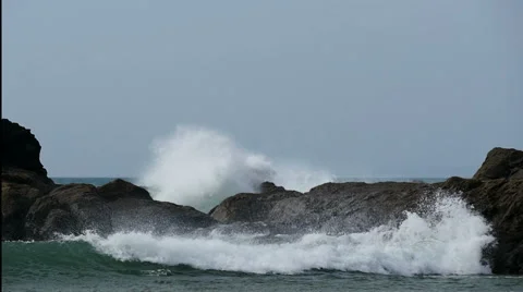 Waves crash on rocks, Cornwall, UK, slow motion Stock Footage 56079269