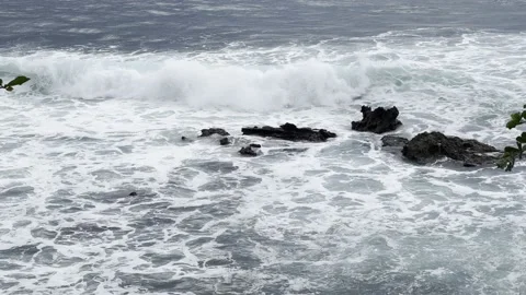 Waves crash on rocks Stock Footage 165082546